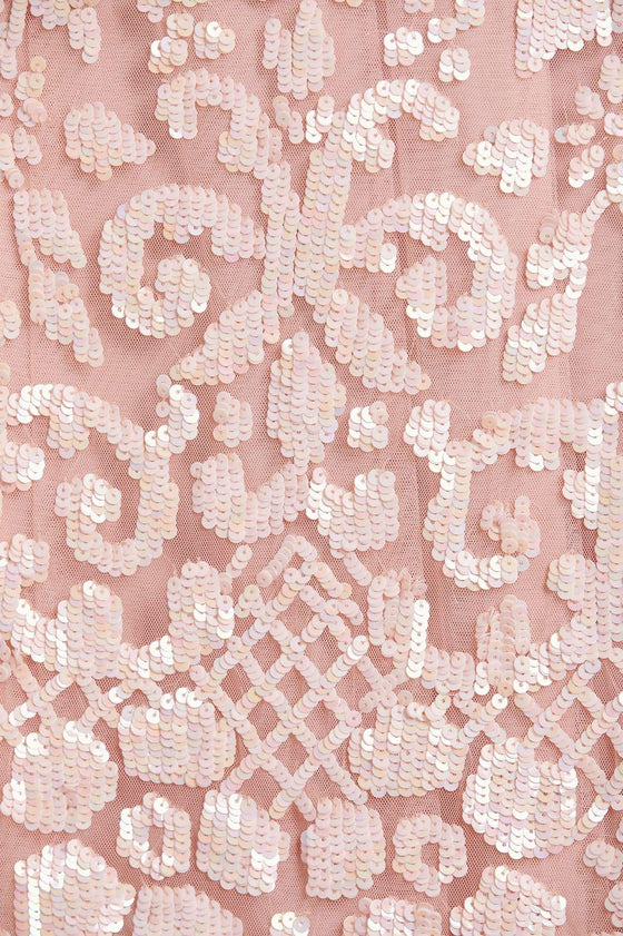 Close up of fabric of modest Needle & Thread Aurelia Gown in pink strawberry icing color.