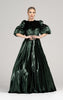 Woman wearing a modest hunter green velvet ball gown with dramatic three quarter voluminous sleeves. 